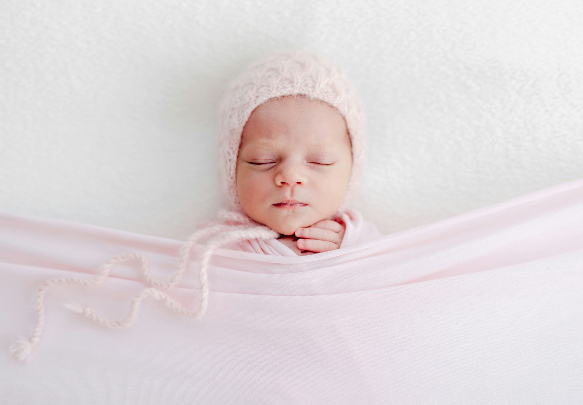 Sleeping newborn baby girl